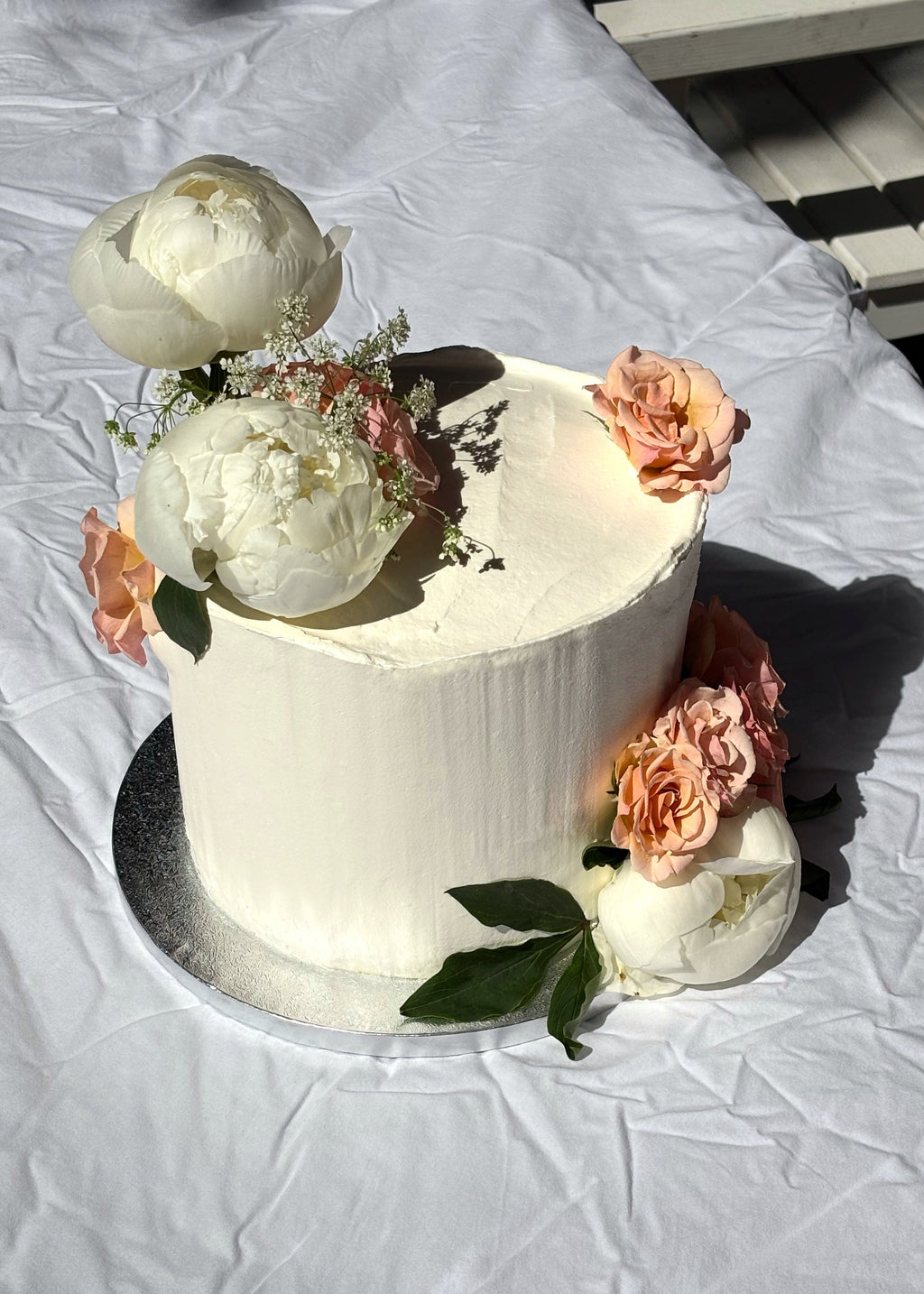 3 layer sponge filled, covered in buttercream